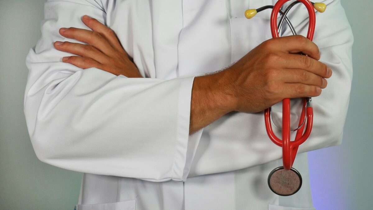 Doctor's hands holding a stethoscope